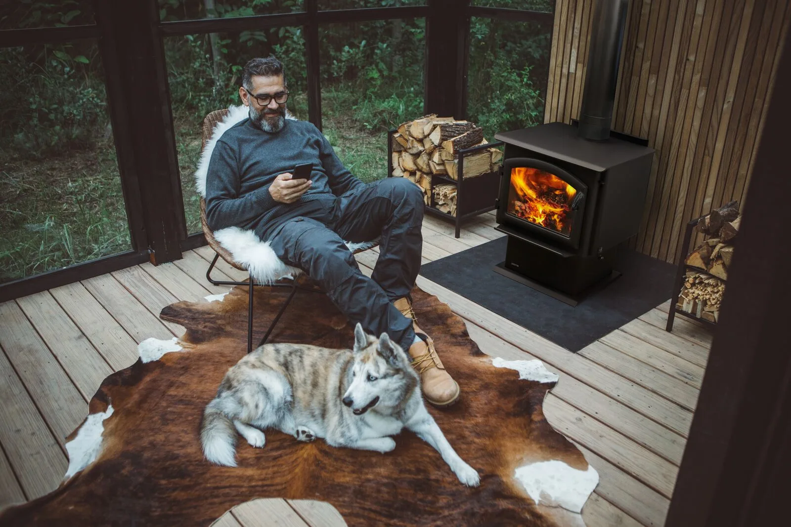 Outdoor gas fireplace built into a covered patio
