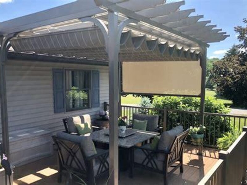 Aristocrat fabric canopy and pergola over a patio — view 3