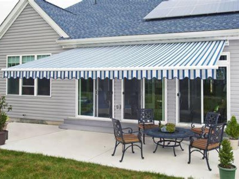 Aristocrat retractable awning shading a back deck — view 2