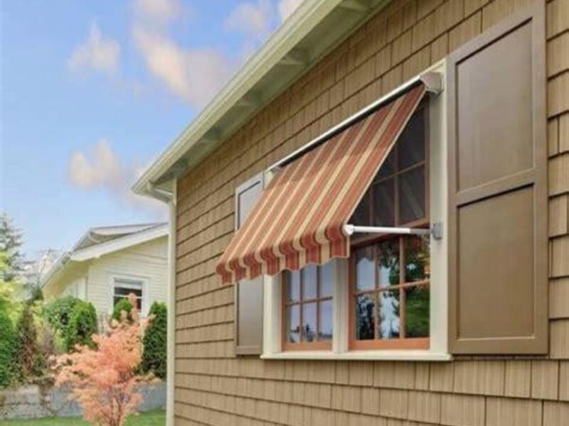 Aristocrat retractable window and porch awning on a house — view 3