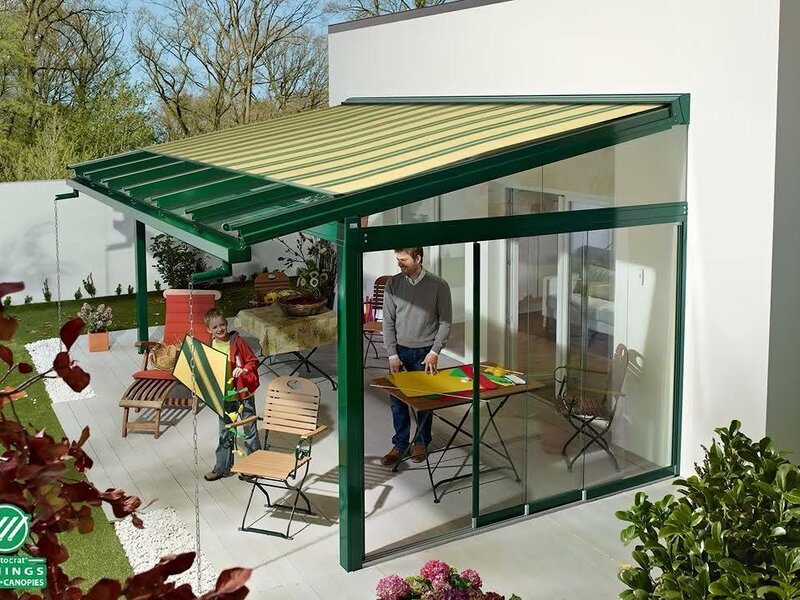 Aristocrat large tension shade over a backyard patio — view 2