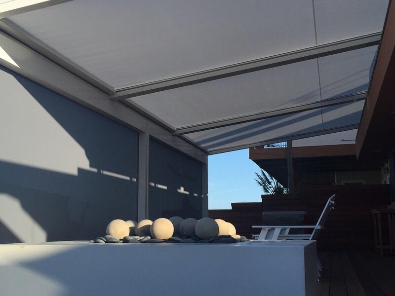 Aristocrat large tension shade over a backyard patio — view 3