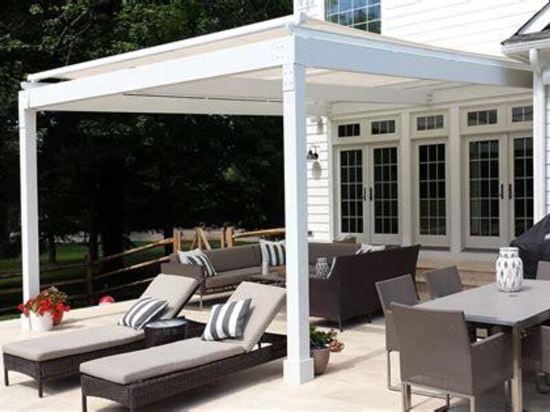 Aristocrat large tension shade over a backyard patio — view 4