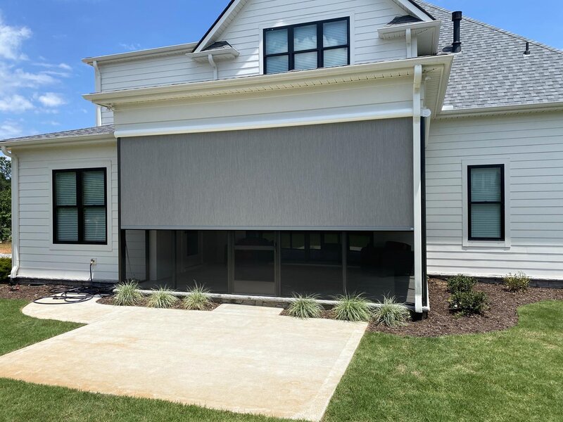 Aristocrat vertical window solar shades on a porch — view 4