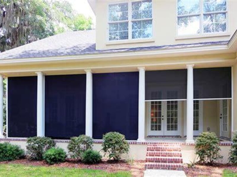 Aristocrat vertical window solar shades on a porch