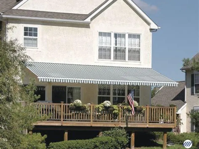 Retractable awning shading a back deck