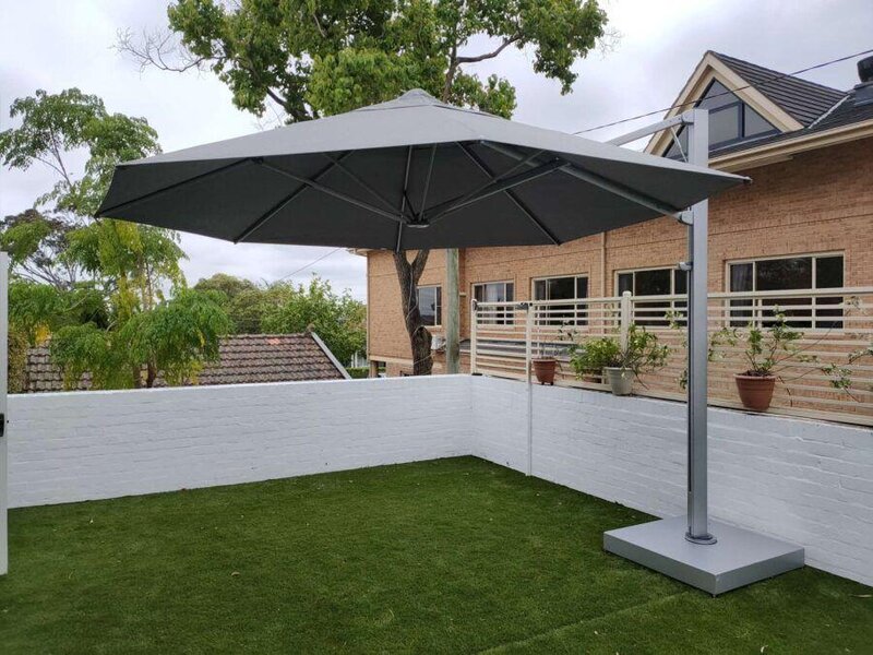 ShadowSpec Serenity single cantilever canopy shading an outdoor lounge
