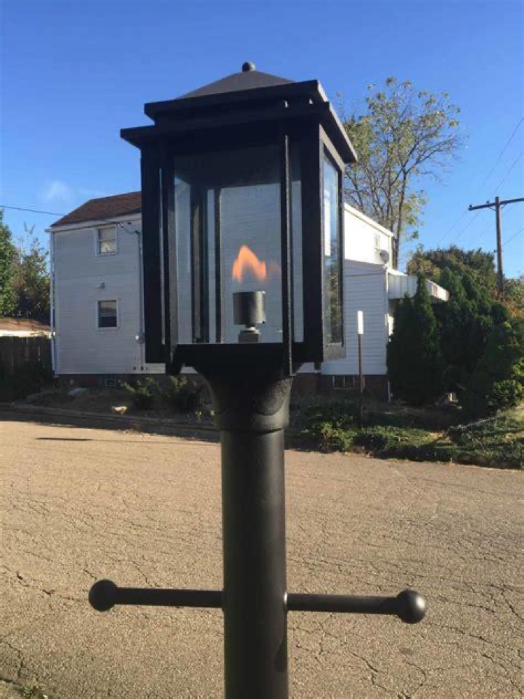 American Gas Lamp Works Cavalier copper lamp on a brick wall — view 7
