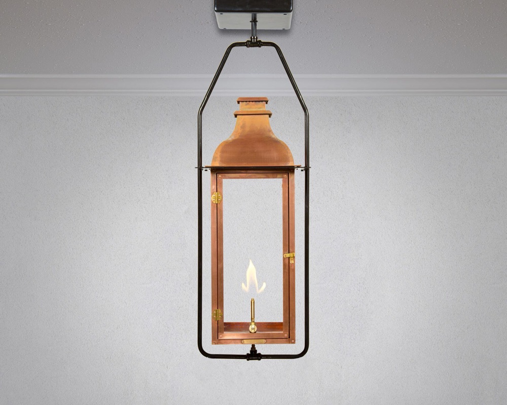 Legendary Lighting Apollo copper gas lantern on a stone wall — view 6