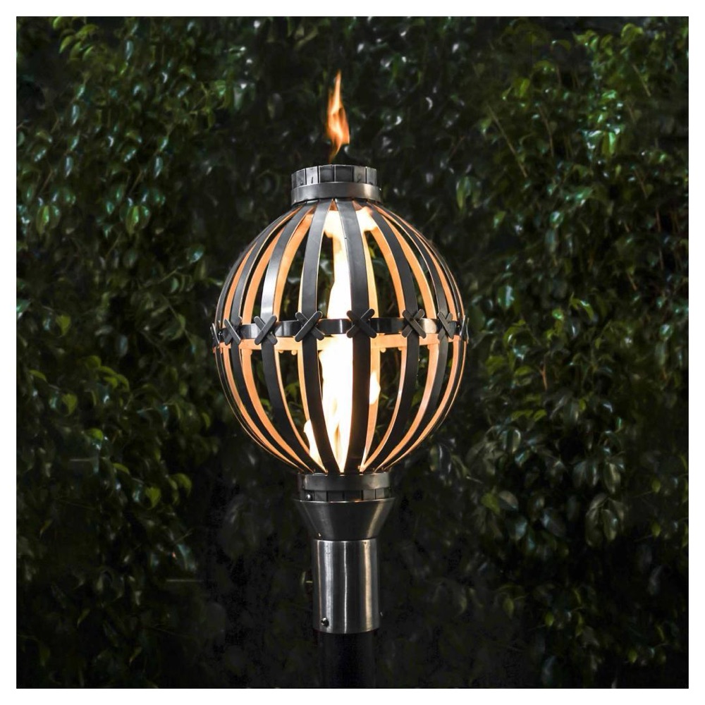 The Outdoor Plus gas lamp and lantern on a stone post
