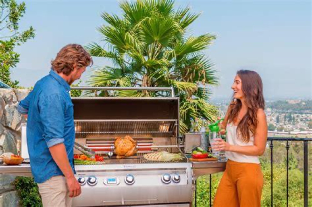 Fire Magic Aurora gas grill on a freestanding cart