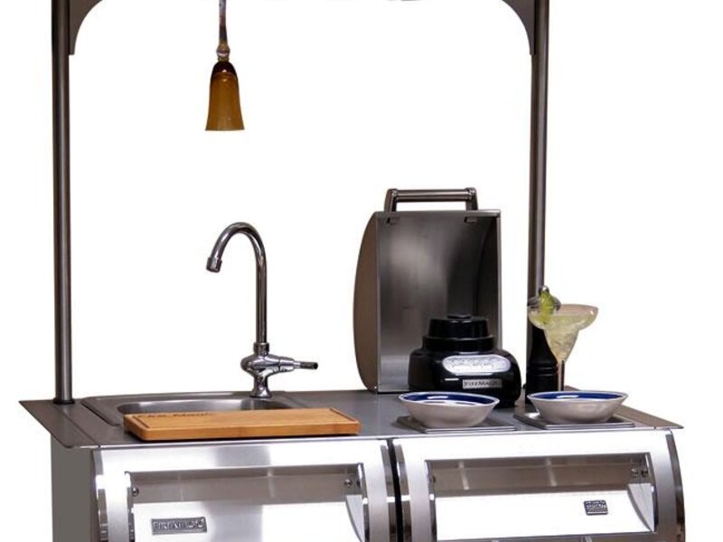 Fire Magic outdoor kitchen island with built-in grill and pizza oven