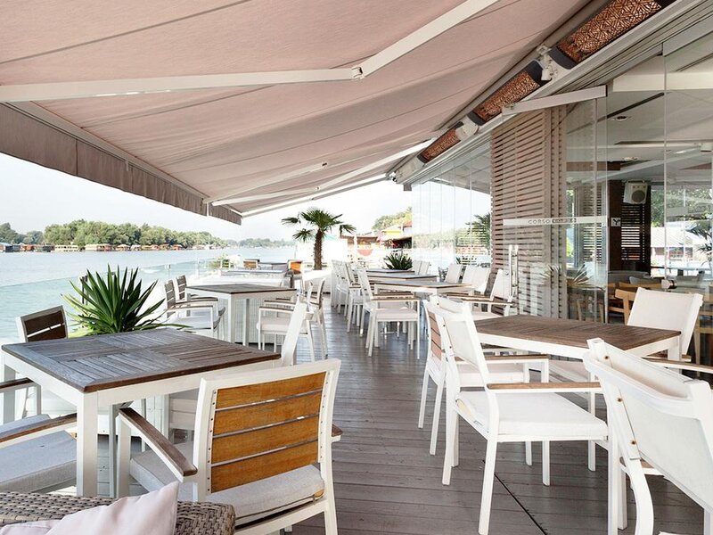 Eurofase electric infrared heaters over a poolside patio — view 6
